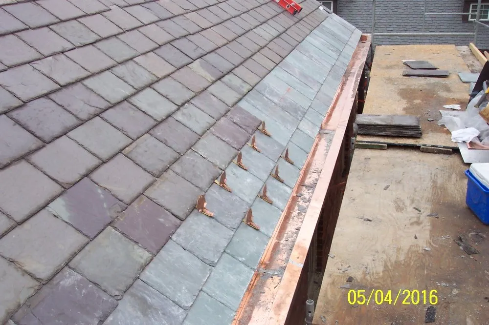 Slide of Skyway Roofing