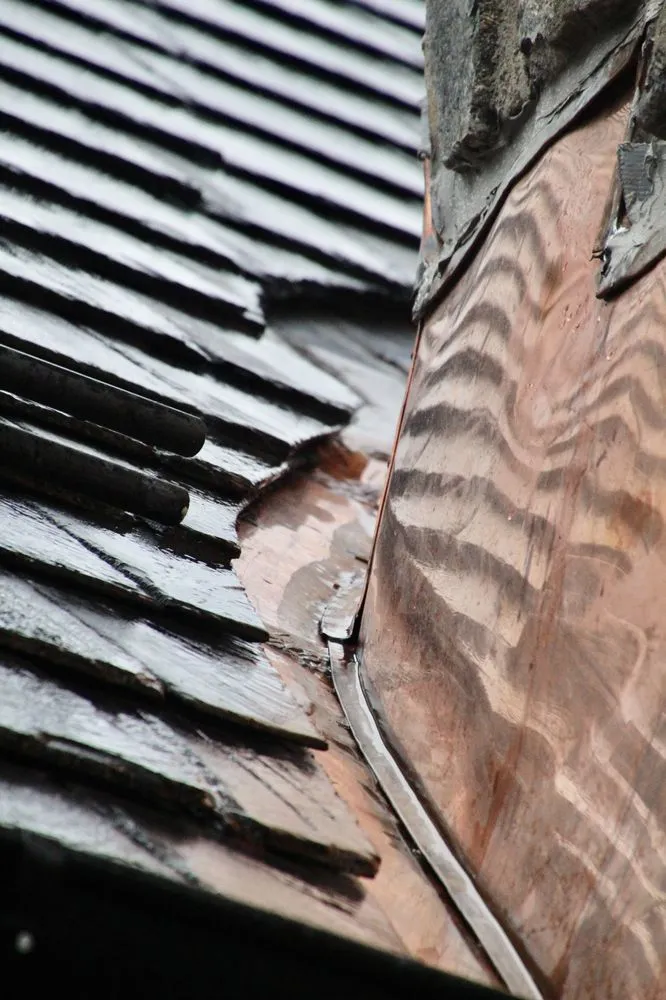 Slide of Slate & Copper Services