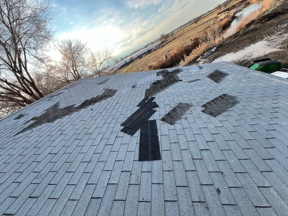 Slide of SLC Roofers