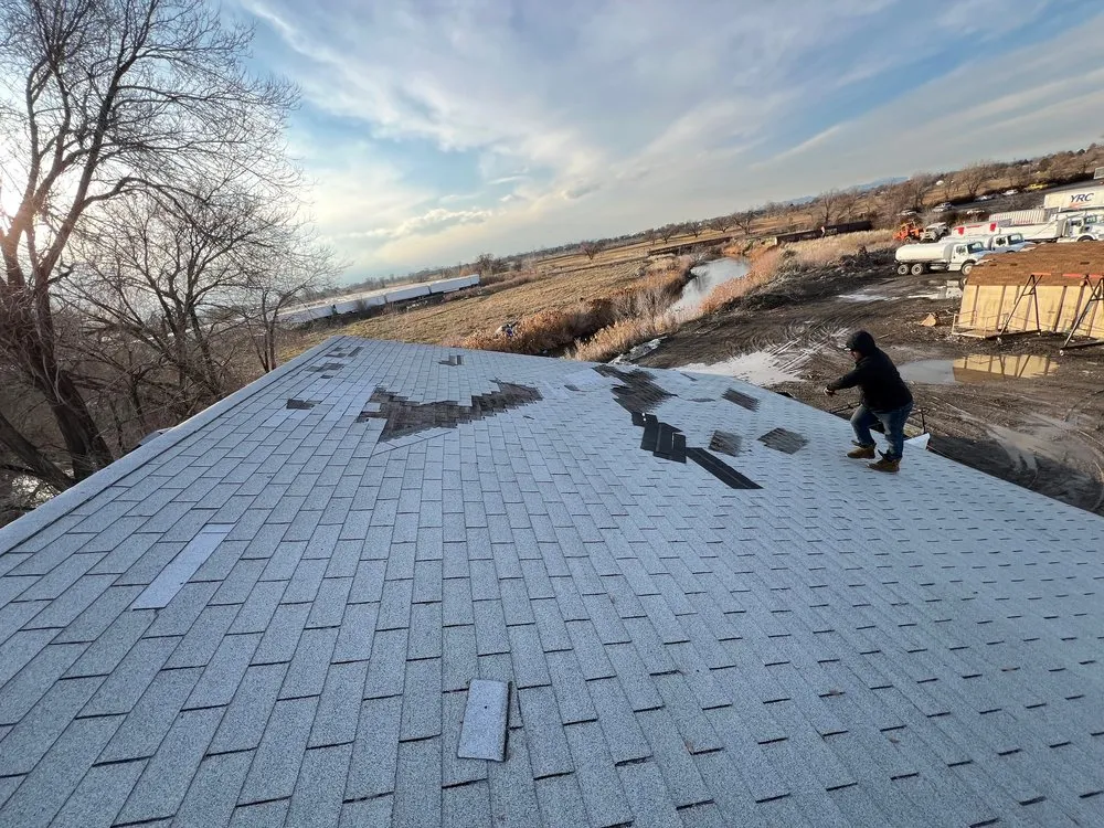 Slide of SLC Roofers
