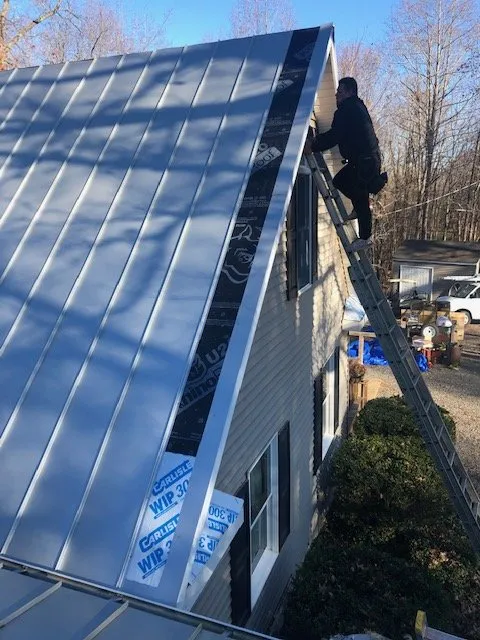 Slide of Sliding Hill Roofing