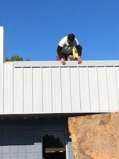 Slide of Sliding Hill Roofing