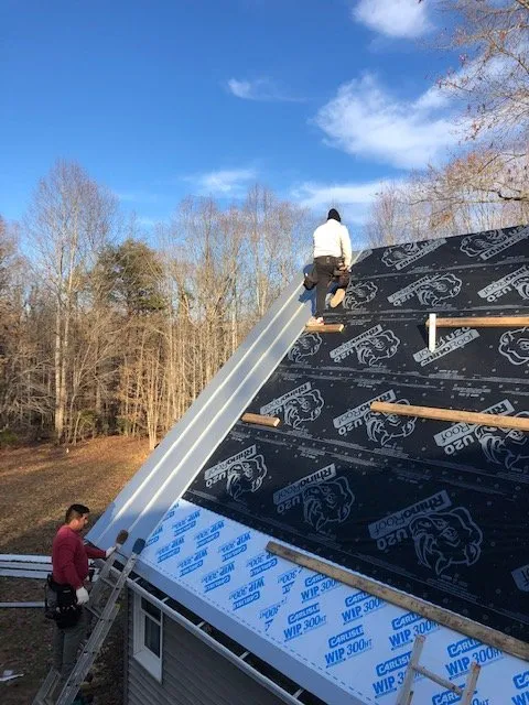 Slide of Sliding Hill Roofing