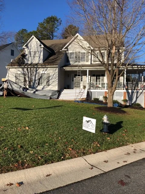 Slide of Sliding Hill Roofing
