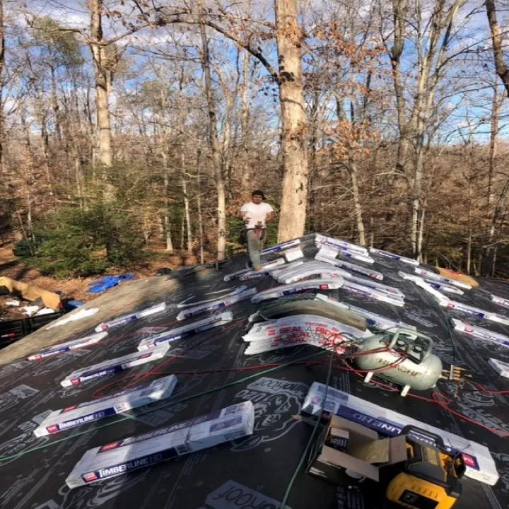 Slide of Sliding Hill Roofing