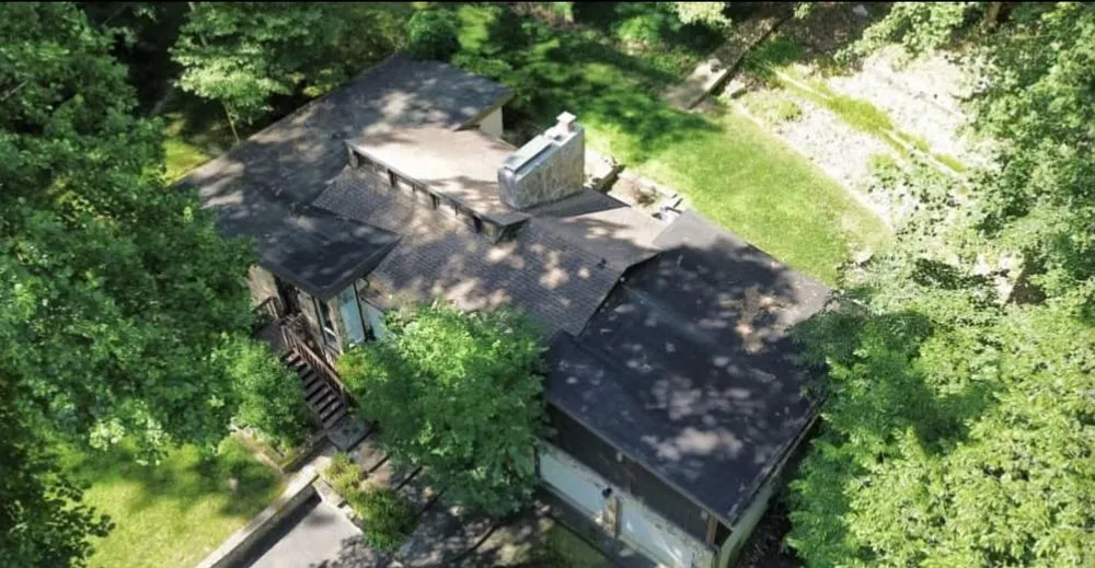 Slide of SlopePro Roofing