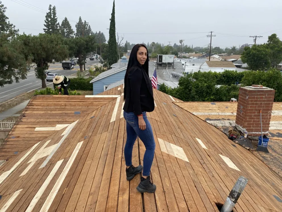 Slide of SLR Roofing