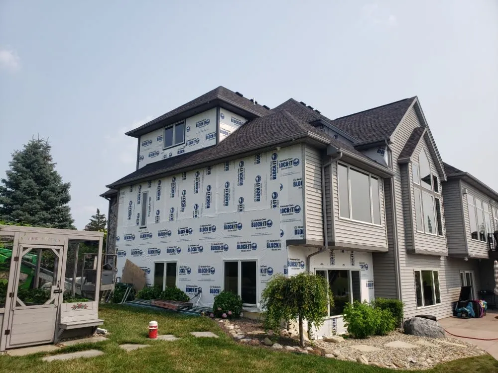 Slide of SLS Roofing and More