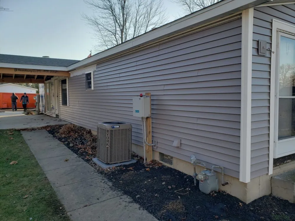 Slide of SLS Roofing and More