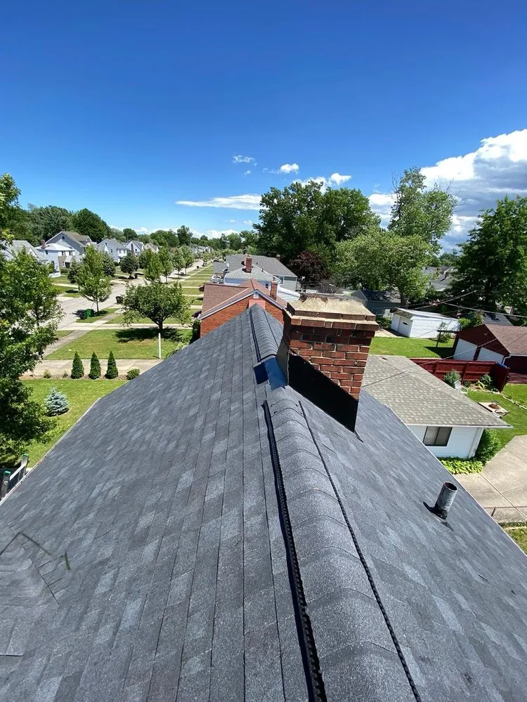 Slide of S.M Revolution Roofing