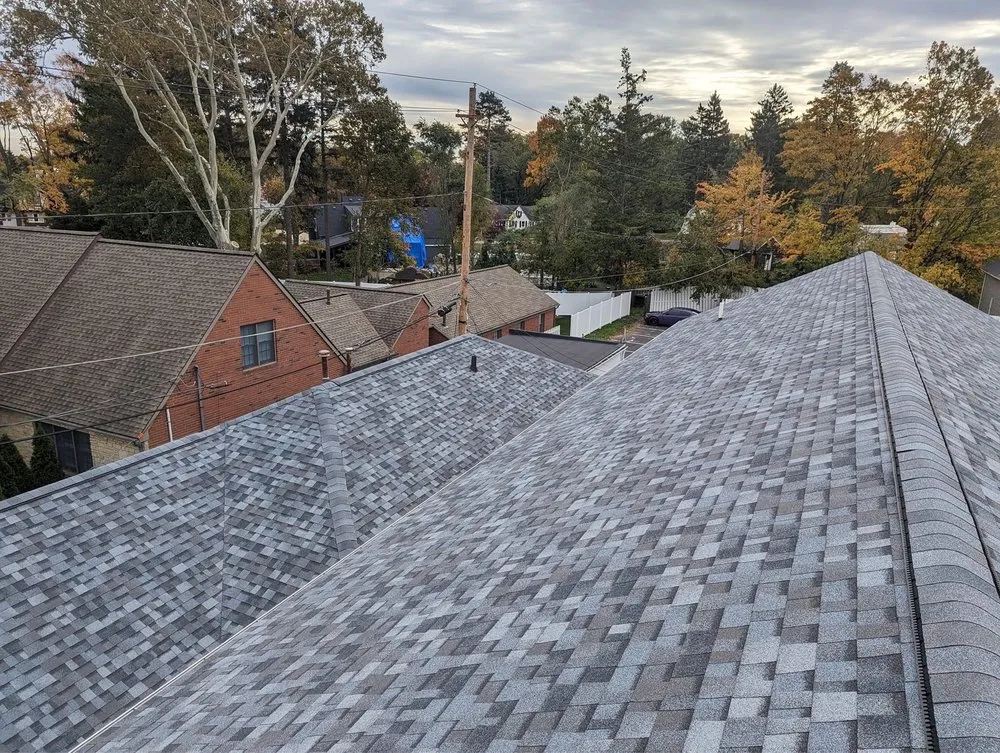 Slide of S.M Revolution Roofing