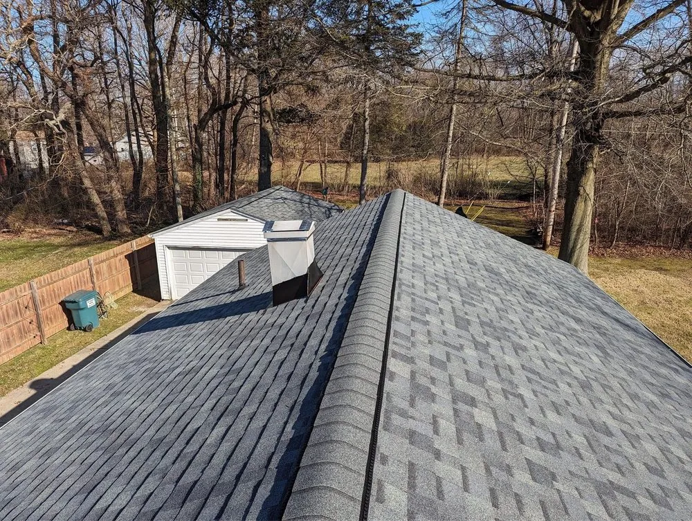 Slide of S.M Revolution Roofing