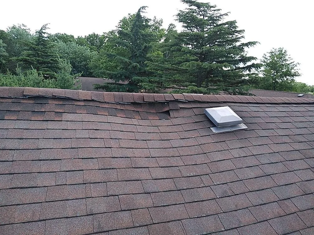 Slide of S&M Roofing