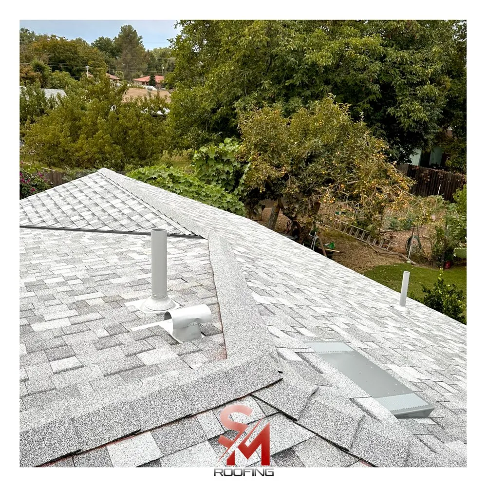 Slide of SM Roofing