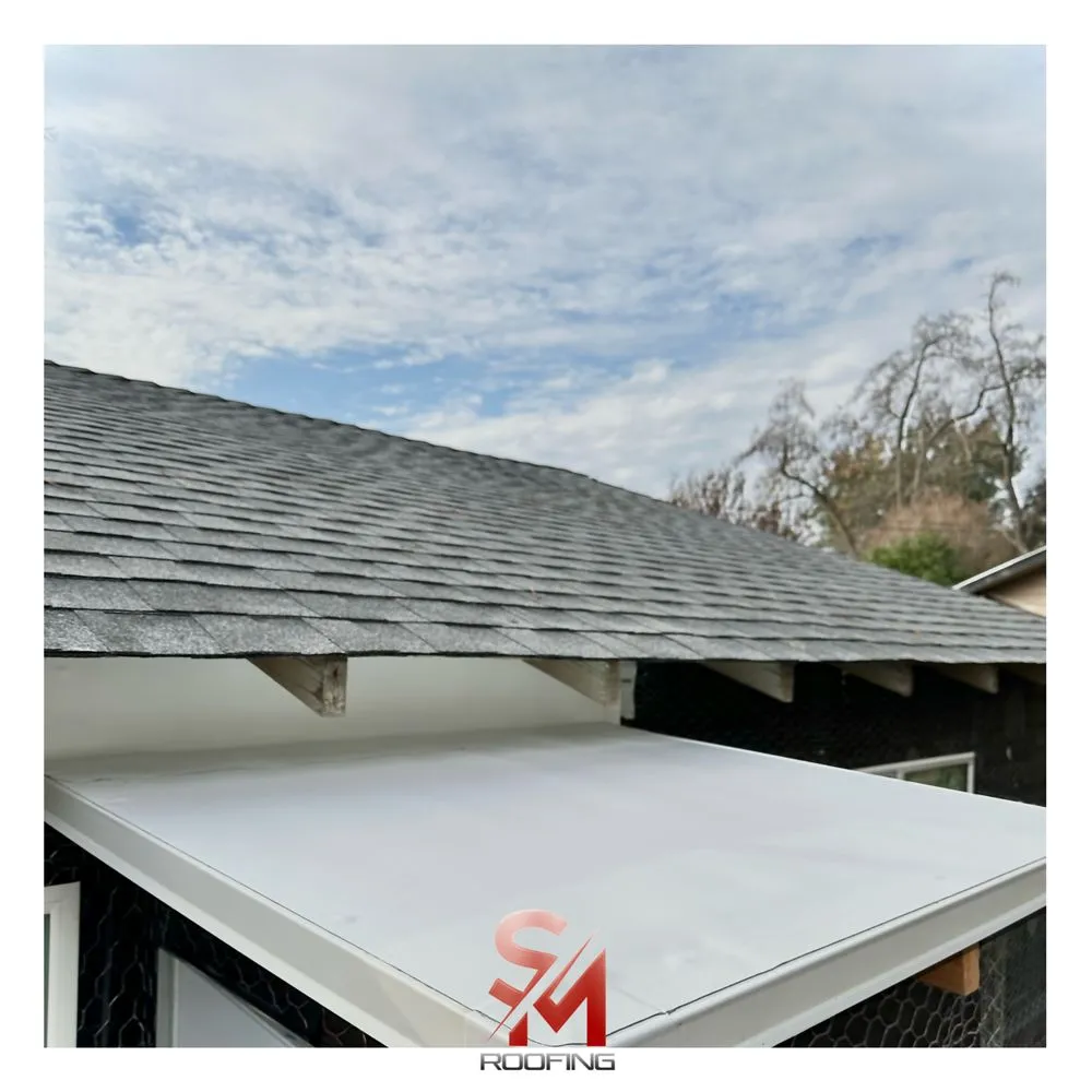 Slide of SM Roofing