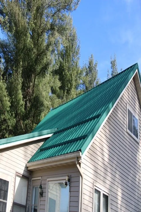 Expert metal roofing installation after storm damage across Sheldon, WI - Smith n Sons Roofing & Gutters