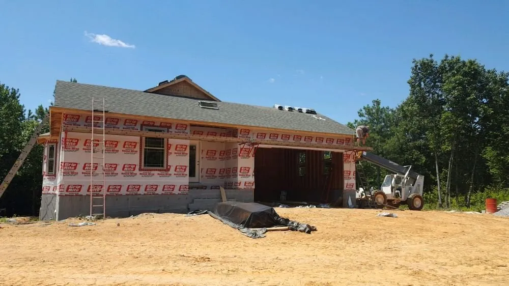 Licensed roof replacement after storm damage in Meherrin, VA by Smith Roofing Company