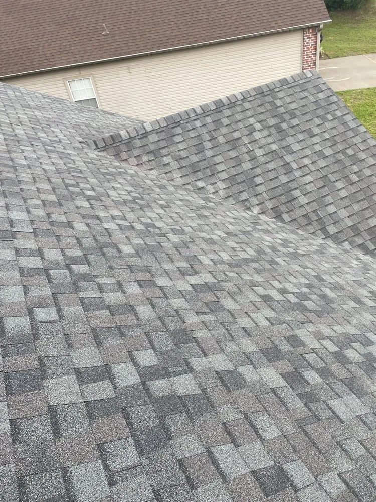 Slide of SMS Roofing