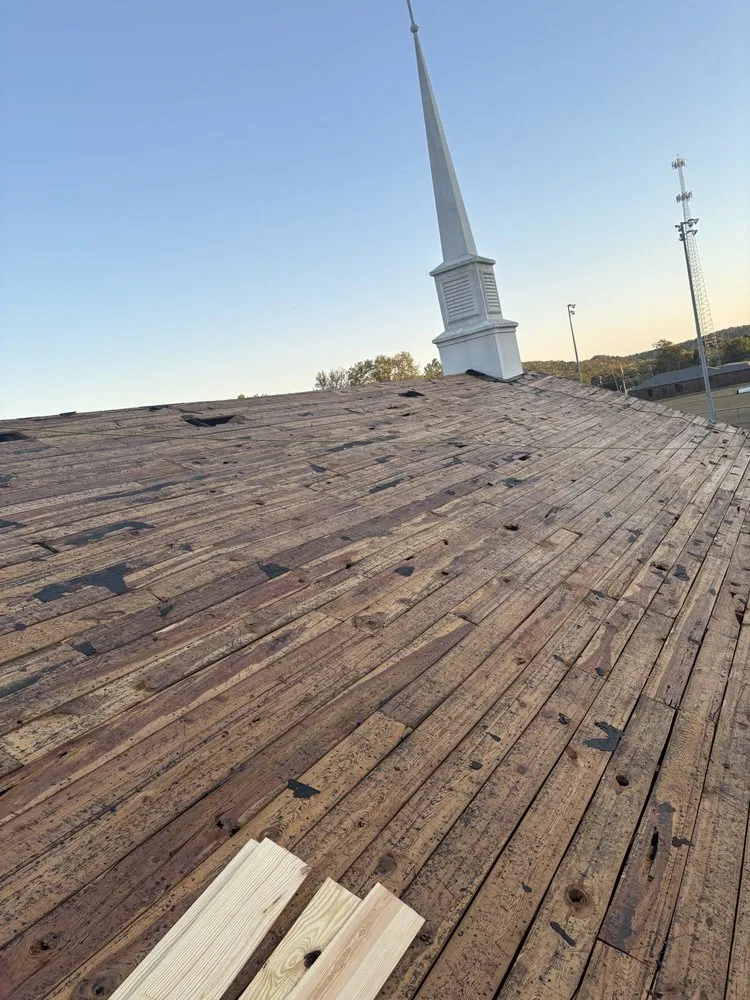 Slide of SMS Roofing