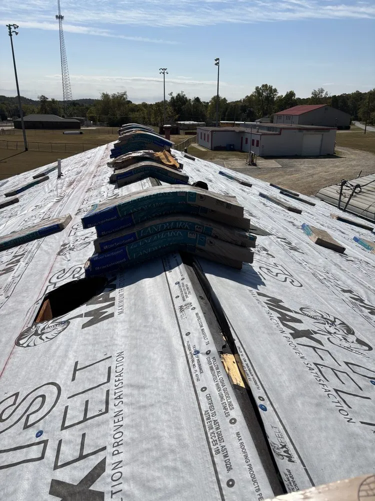 Slide of SMS Roofing