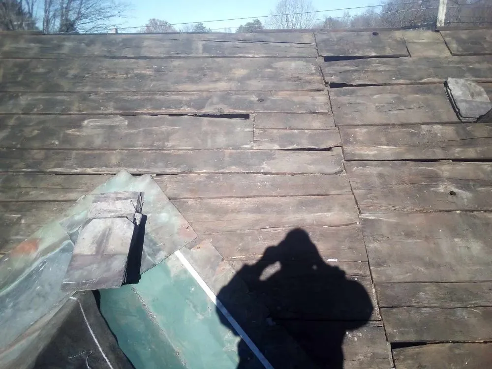 Slide of S&N Roofing