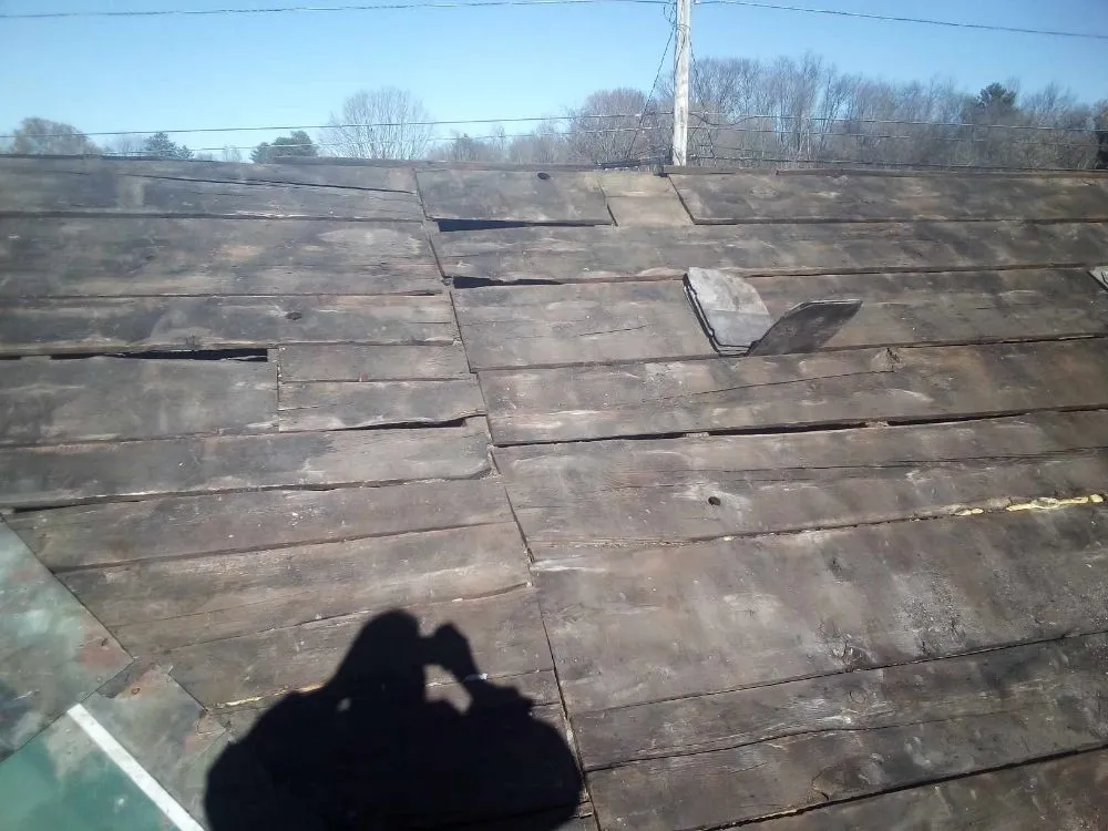 Slide of S&N Roofing