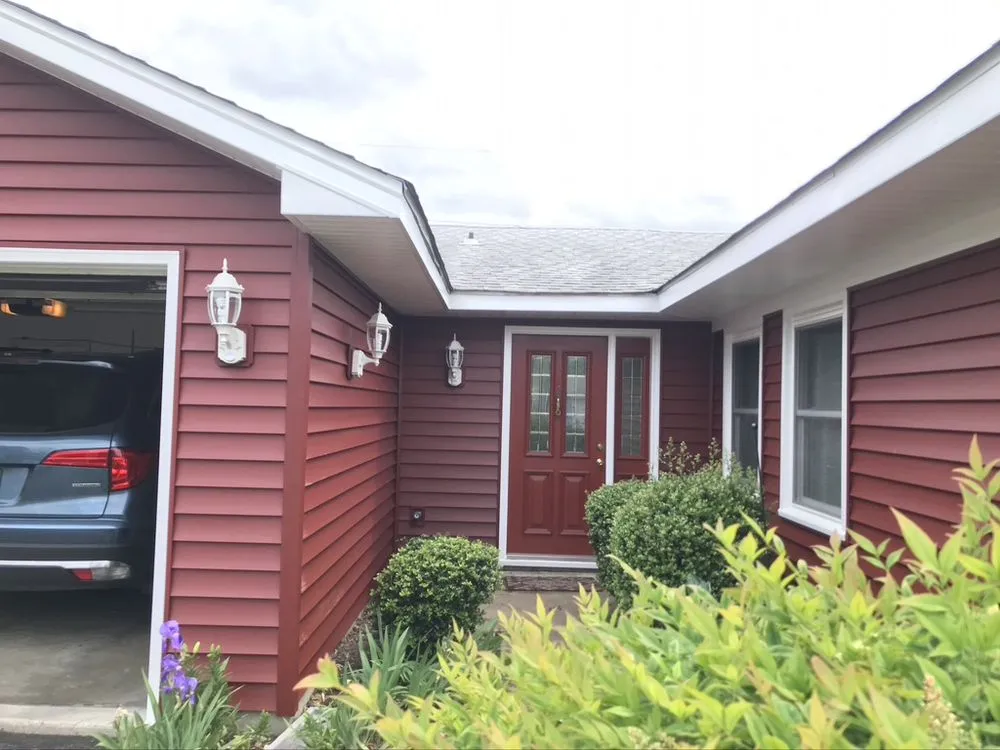 Slide of Snap Roofing Siding & Windows