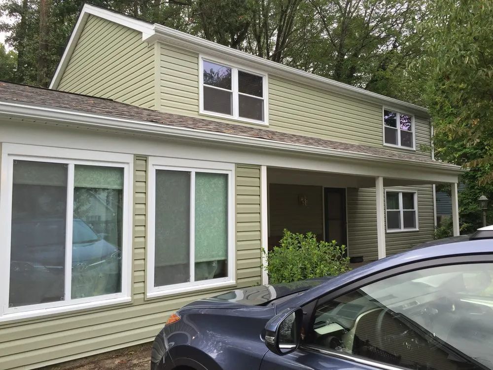 Slide of Snap Roofing Siding & Windows