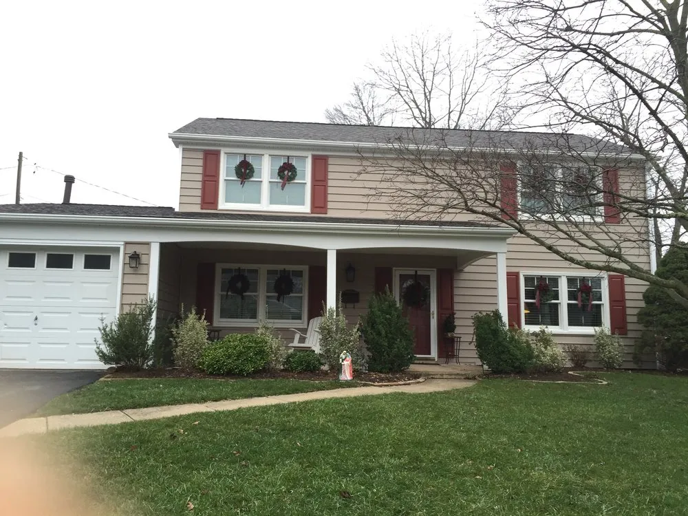 Slide of Snap Roofing Siding & Windows