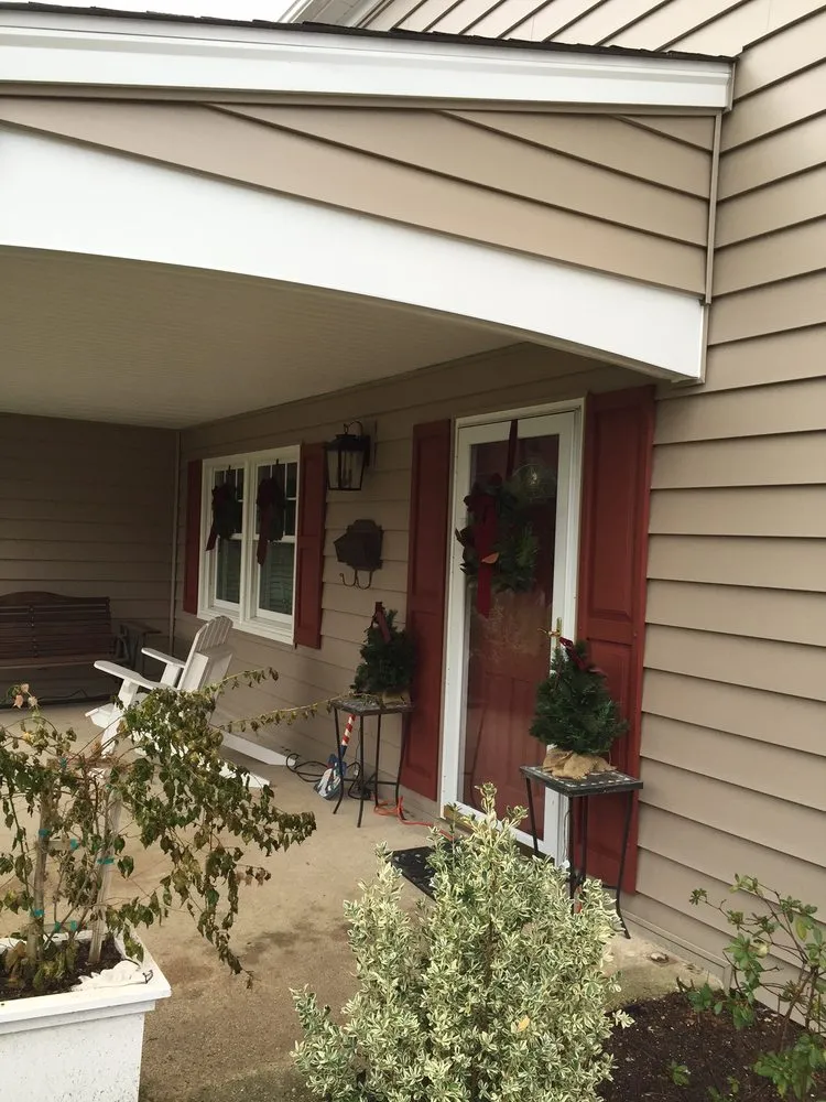 Slide of Snap Roofing Siding & Windows