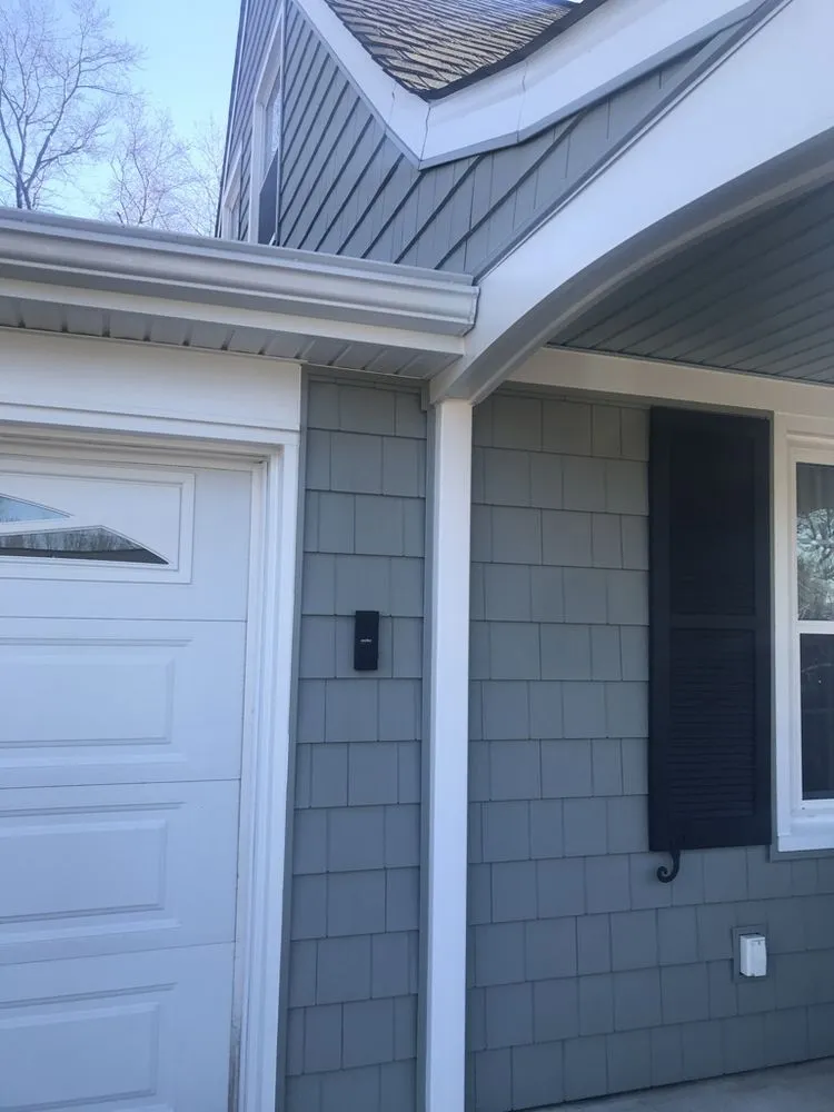 Slide of Snap Roofing Siding & Windows