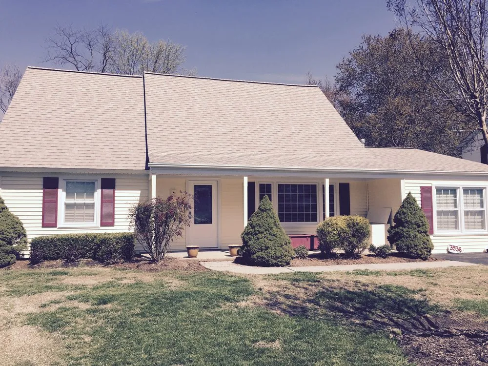 Slide of Snap Roofing Siding & Windows