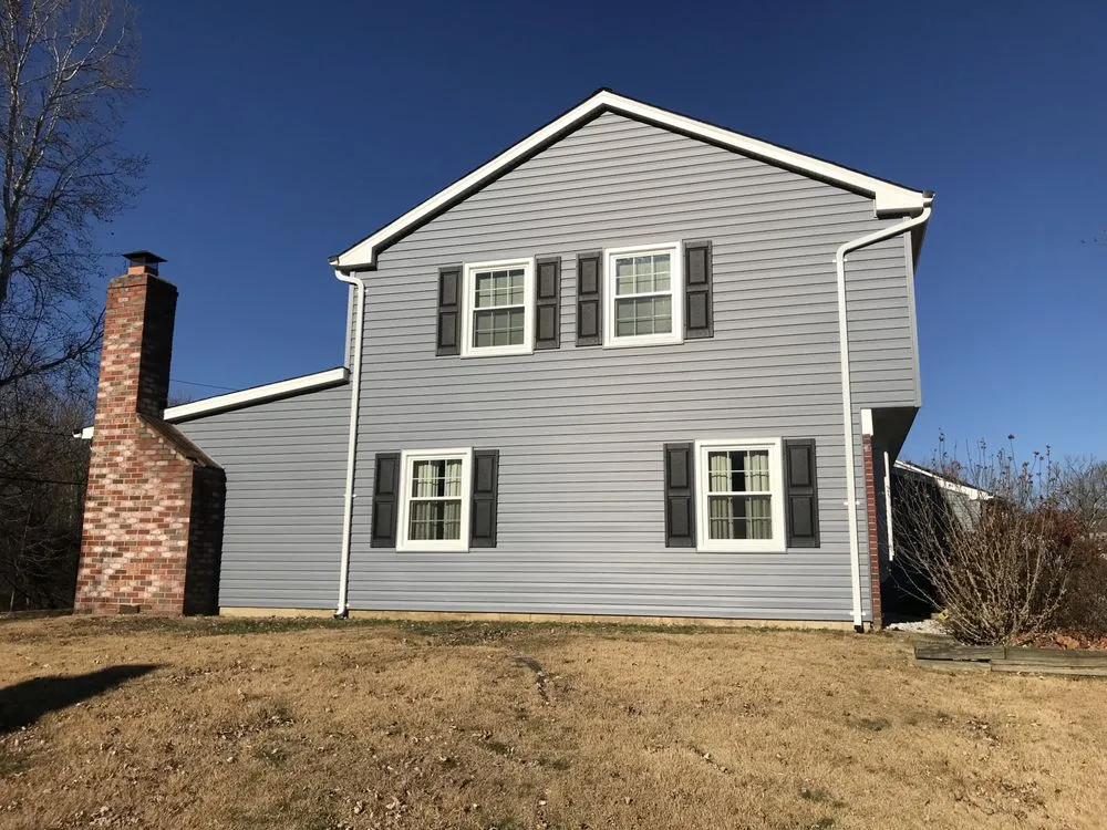 Slide of Snap Roofing Siding & Windows