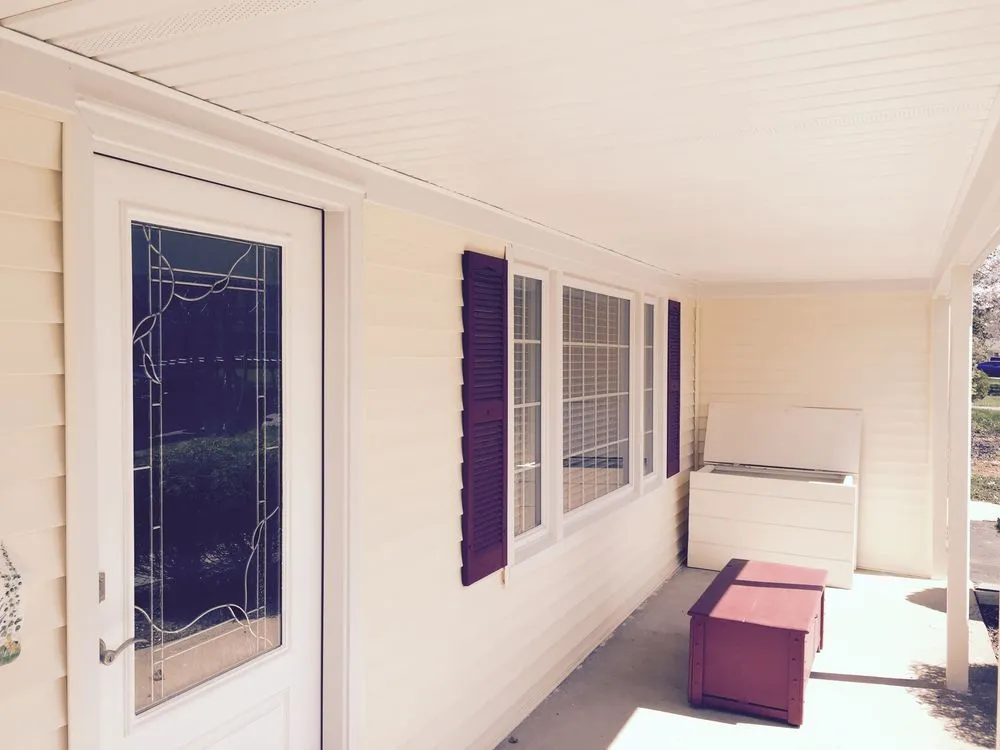 Slide of Snap Roofing Siding & Windows