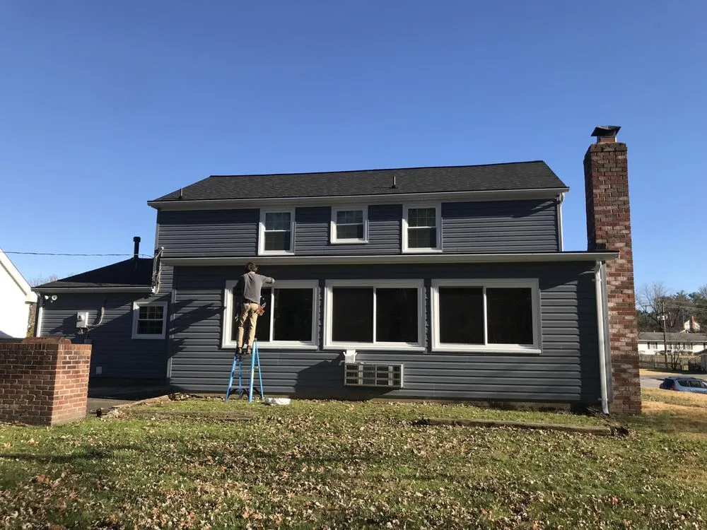 Slide of Snap Roofing Siding & Windows