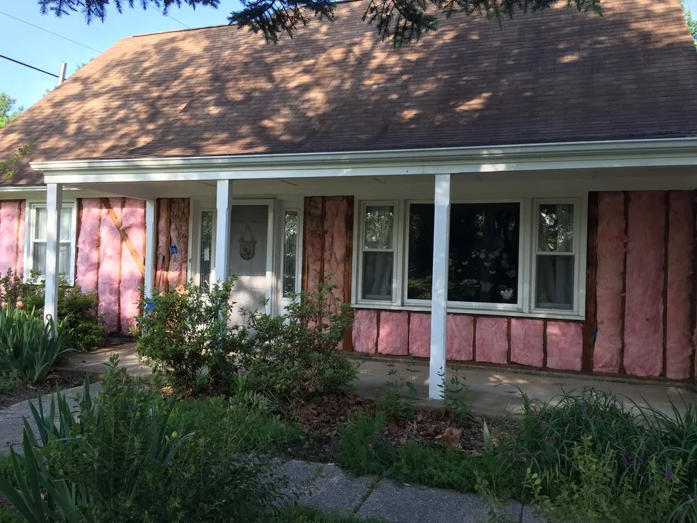 Slide of Snap Roofing Siding & Windows