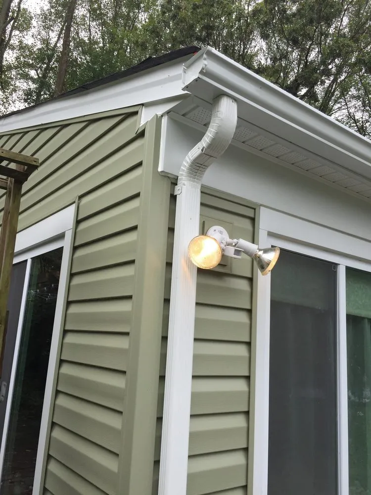 Slide of Snap Roofing Siding & Windows