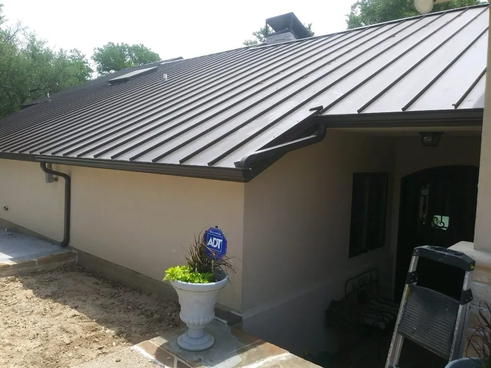 Slide of SNE Roofing & Remodeling
