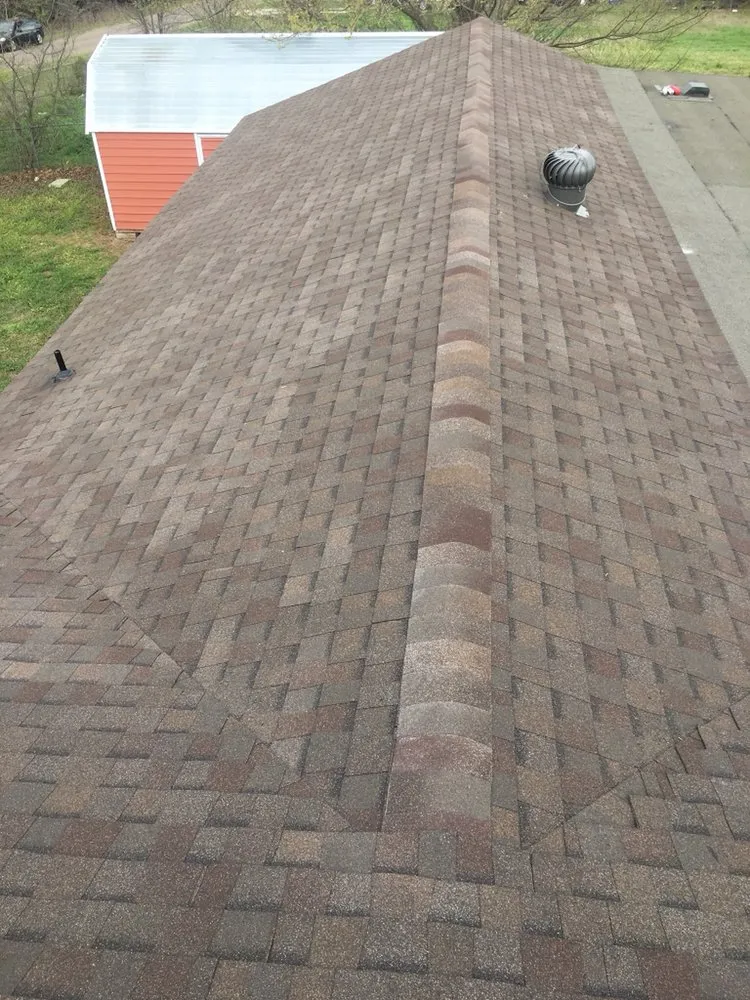 Slide of SNE Roofing & Remodeling