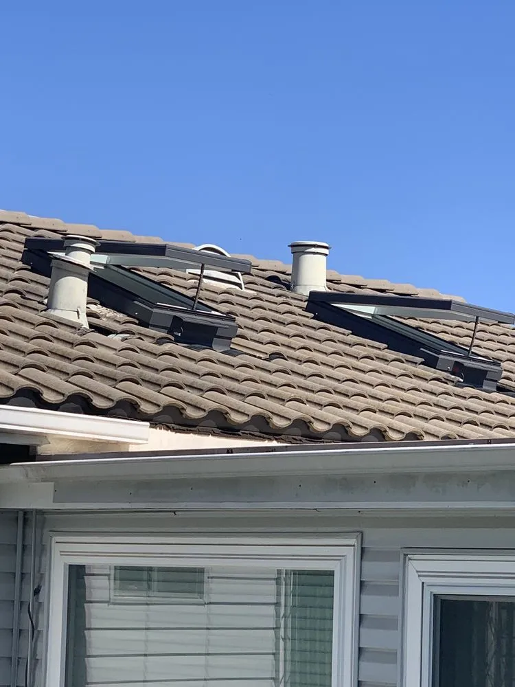 Slide of Snook Skylights and Roofing