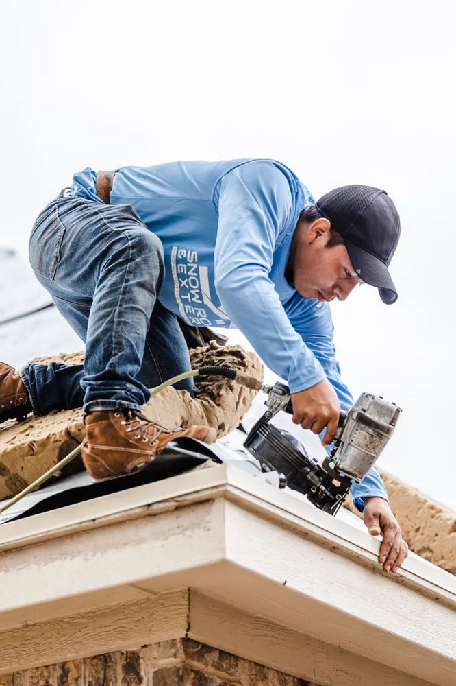 Slide of Snow Roofing and Exteriors