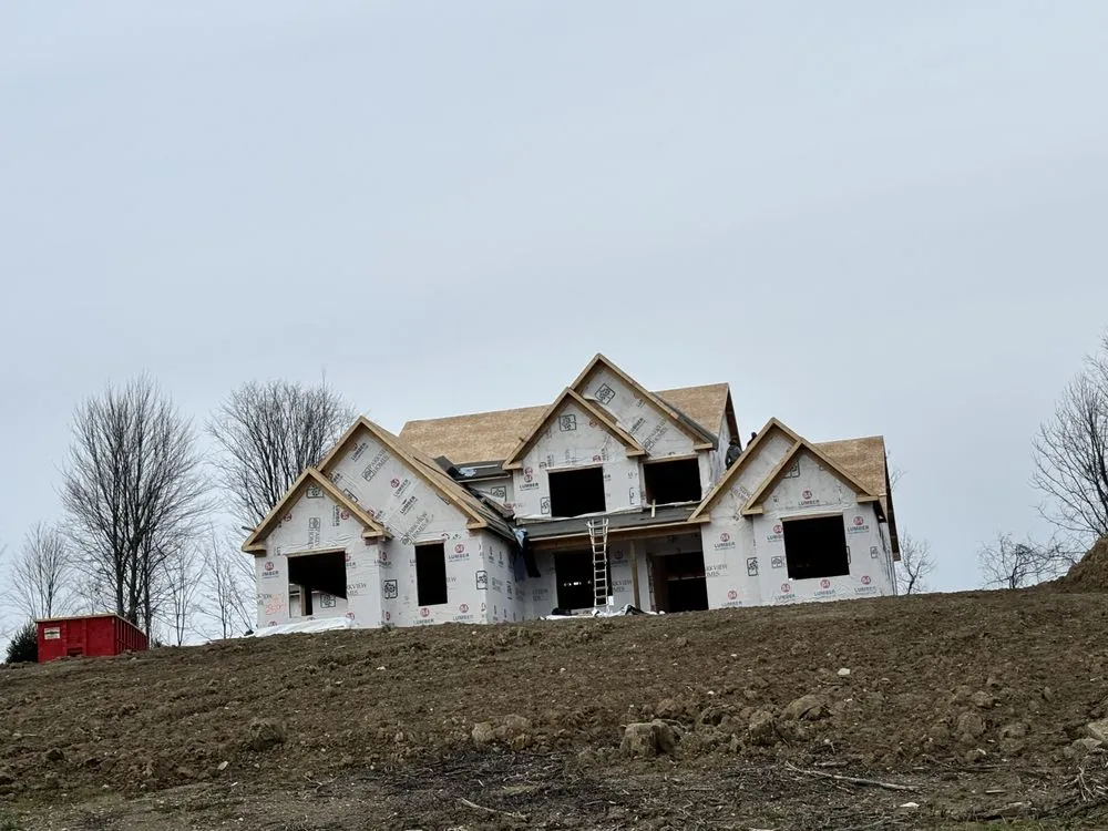 Slide of SNR Roofing