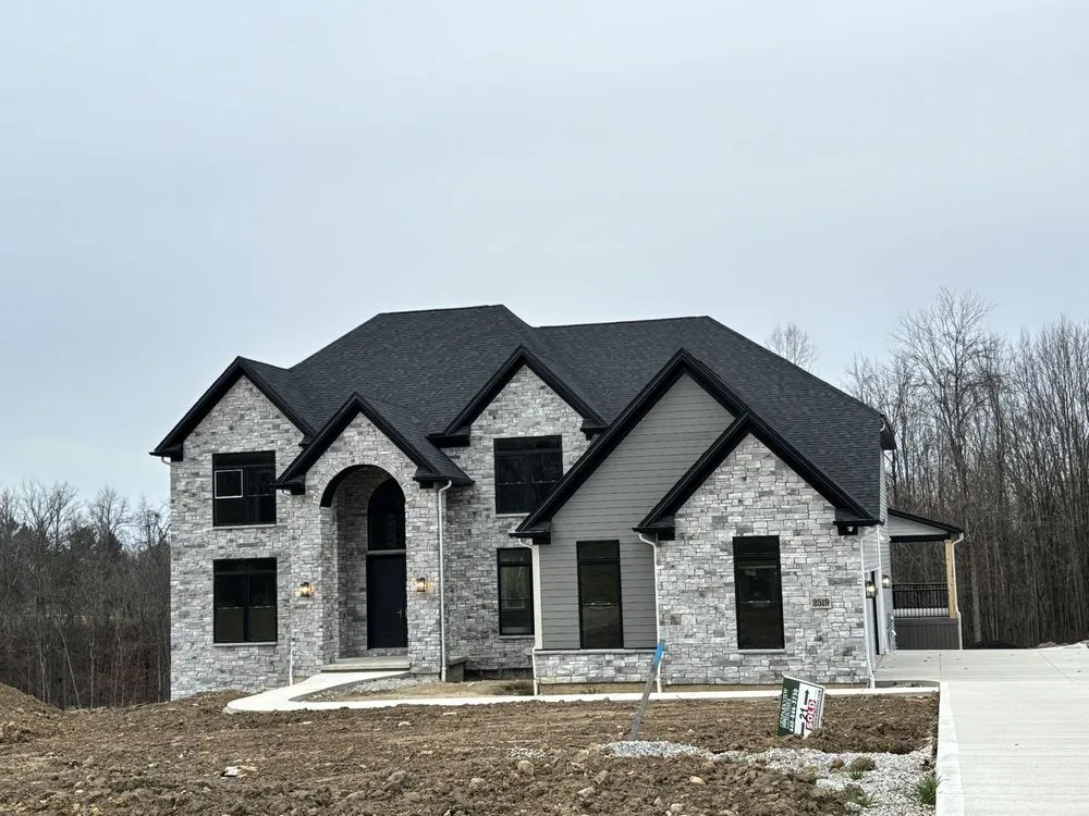 Slide of SNR Roofing