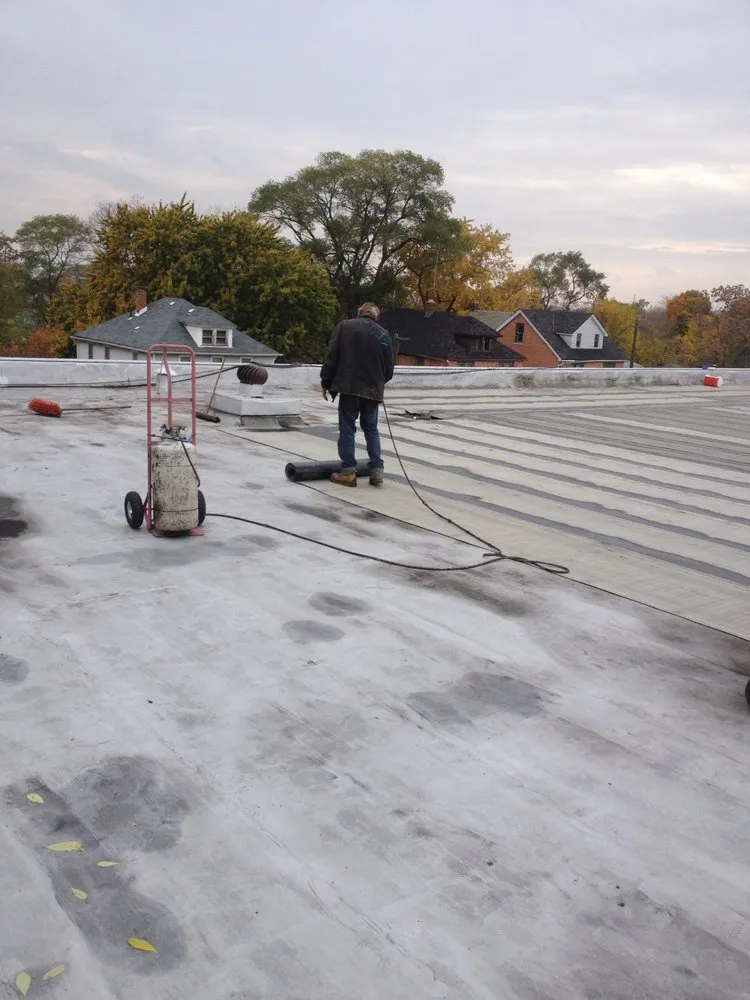 Slide of Socia's Commercial and Residential Flat Roofing