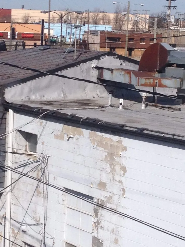 Slide of Socia's Commercial and Residential Flat Roofing