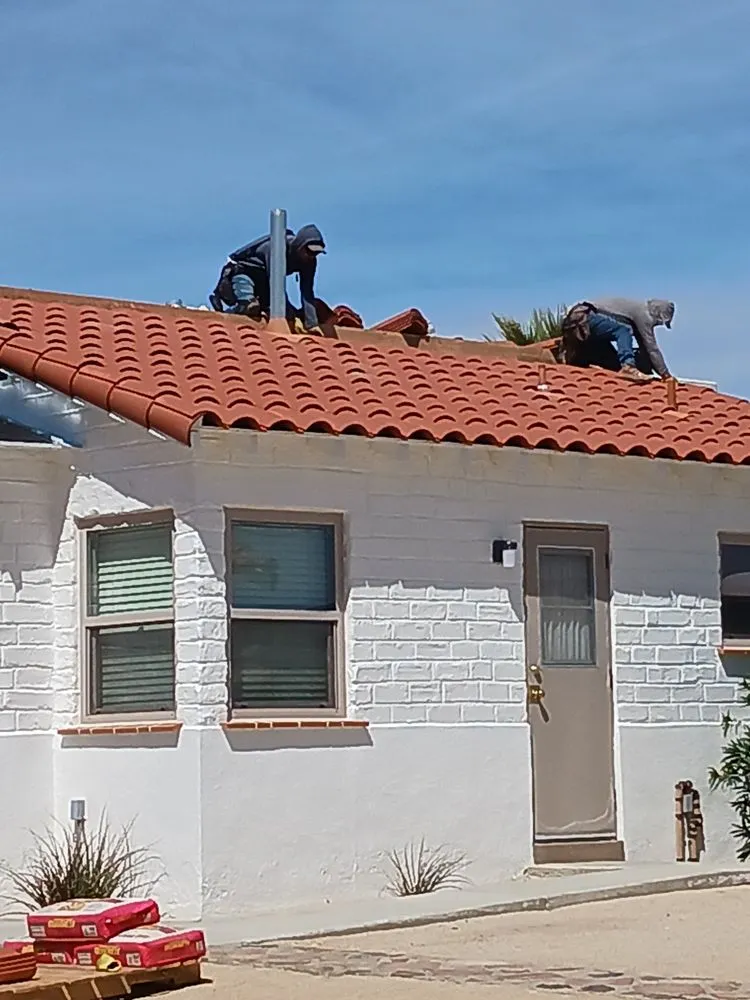 Slide of Solano's Roofing