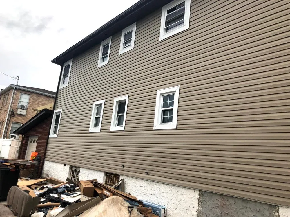 Local shingle roofing service in South Richmond hill, NY - Solid Builders