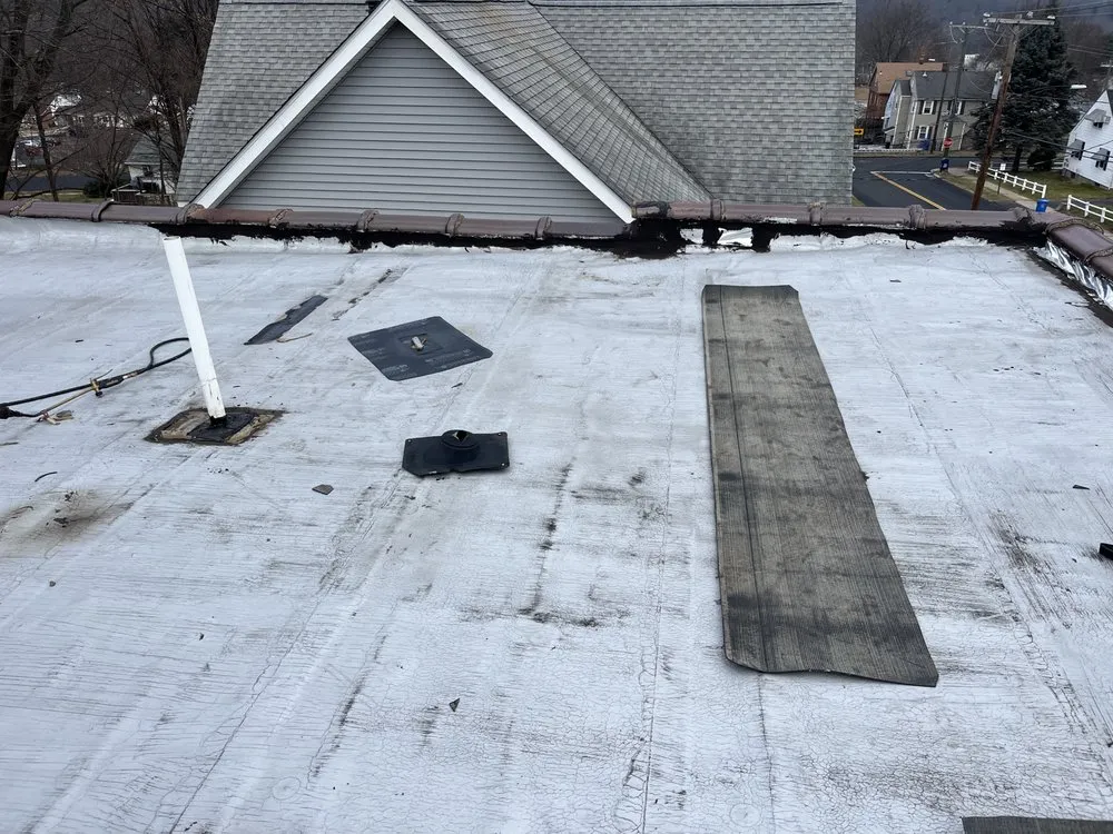 Slide of Solid Rock Roofing