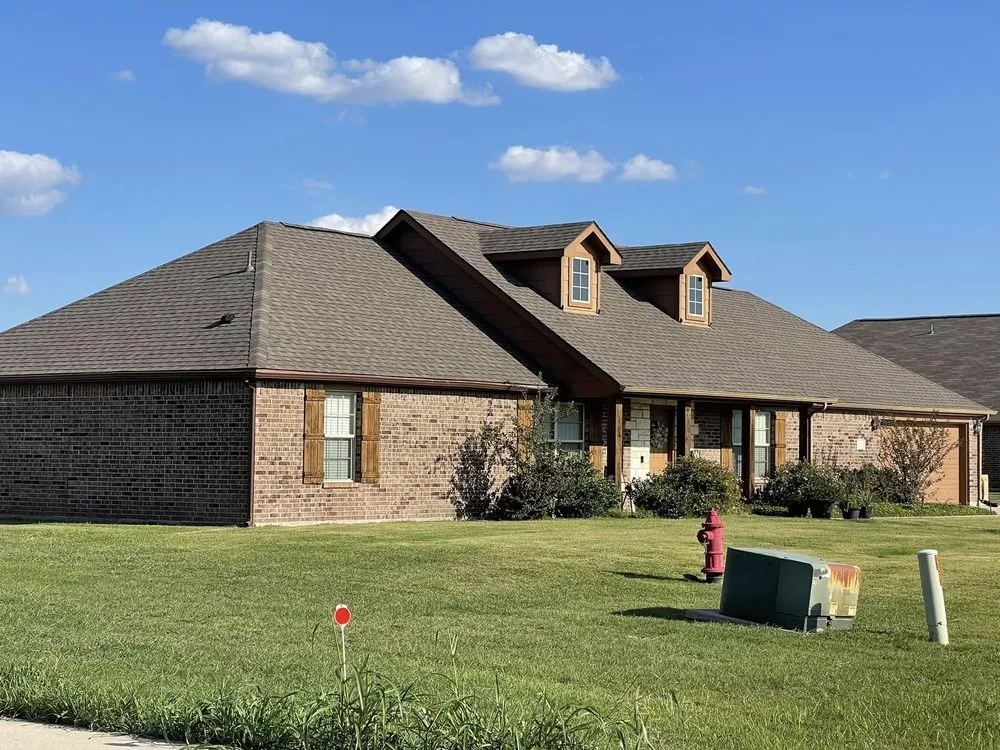 Slide of Solotzo Roofing