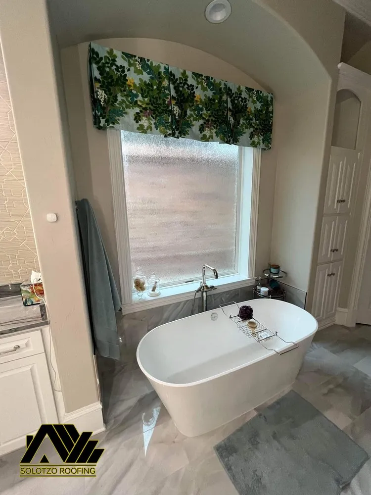 Slide of Solotzo Roofing